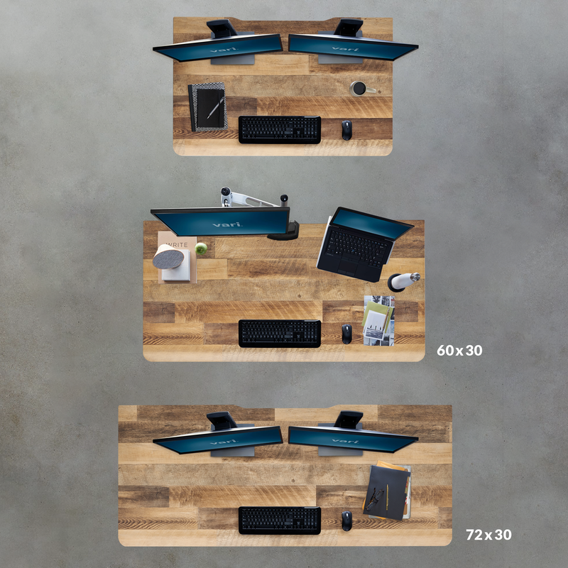 Overhead view of all sizes of Electric Standing Desk with ComfortEdge in Reclaimed Wood image number null